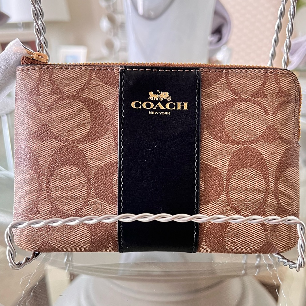 Coach Corner Zip Wristlet In Signature Canvas